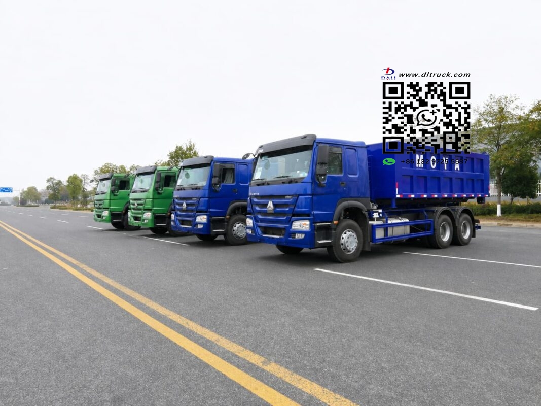 Four Howo roll off garbage trucks prepared for Cote d'Ivoire delivery