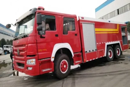 HOWO foam fire truck side profile view on road