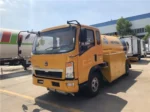 HOWO 8000L LPG bobtail truck exterior side view