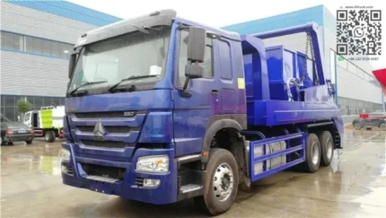 Sinotruk Howo 6X4 garbage truck side view with skip loader body