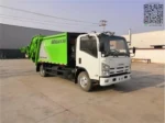 ISUZU 700P rear loader garbage truck side profile view