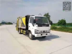 ISUZU 600P 120HP compressed garbage truck rear view