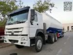 Side view of the 3 axle fuel tanker semi trailer showing full tank body