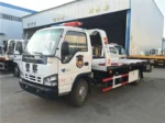 ISUZU 600P flatbed road wrecker with loading plate visible