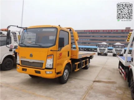 Sinotruk HOWO 4tons flatbed breakdown lorry side profile view