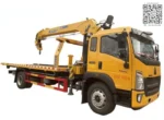 HOWO flatbed tow truck with XCMG crane from front angle