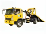 HOWO 5Tons road wrecker flatbed towing truck front three-quarter view