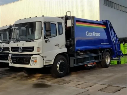 Rear loading hopper on compactor garbage truck