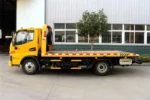 Hydraulic flatbed loading ramp on recovery truck