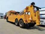 H type front outrigger and L type rear outrigger extended on wrecker truck