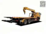 HW76 cabin white Sinotruk tow truck side view