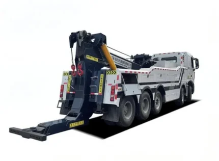 Integrated crane and winch system on wrecker truck rear