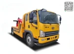 Integrated towing boom and winch system on truck bed