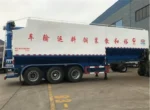 Six compartment hydraulic auger discharge system