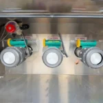 API manhole cover and pneumatic bottom valve on tanker trailer