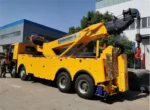 Lifting forks and hydraulic outriggers deployed