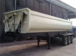 Heavy duty I beam chassis of Chengli 50 ton side tipper