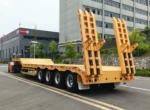 Low bed design for transporting heavy equipment