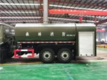 Water sprinkler fire truck rear showing CB10/40 pump and long warning lamp on cabin