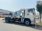 Bucket truck performing overhead line maintenance work