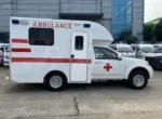 Self-loading aluminum stretcher inside ambulance
