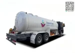 Close-up of LPG filling hose and flow meter system on truck