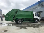 Control panel at rear of garbage truck