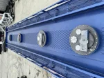 Top walkway with foldable handrail on fuel tanker