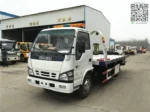 Isuzu diesel engine 4KH1CN5HS under cab of tow truck