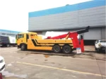 Lifting arm extended at 33 degree slope angle on HOWO wrecker recovery vehicle