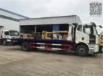 FAW chassis flatbed recovery truck in diesel configuration with manual transmission