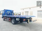 Flatbed tow truck hydraulic tilting mechanism detail