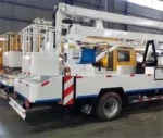 H-type outrigger landing legs deployed on the aerial bucket truck chassis