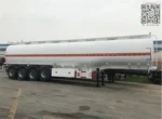 Rear of fuel tank trailer with discharge valves and rubber hose