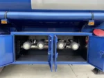Pneumatic bottom valve and API discharging valve assembly