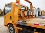Rear flatbed platform folded up on breakdown lorry