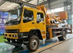 Engine compartment showing ISUZU 4KH1-TC60 diesel engine