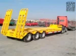 Hydraulic or spring ramp loading system on low bed trailer