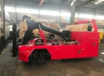Folded underlift arms in transport position on Chengli wrecker body kit
