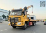 Side view of Chengli flatbed tow truck with crane