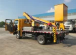 HOWO 12m aerial work platform truck front three-quarter view