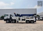 Integrated toolbox and forklift storage on wrecker body